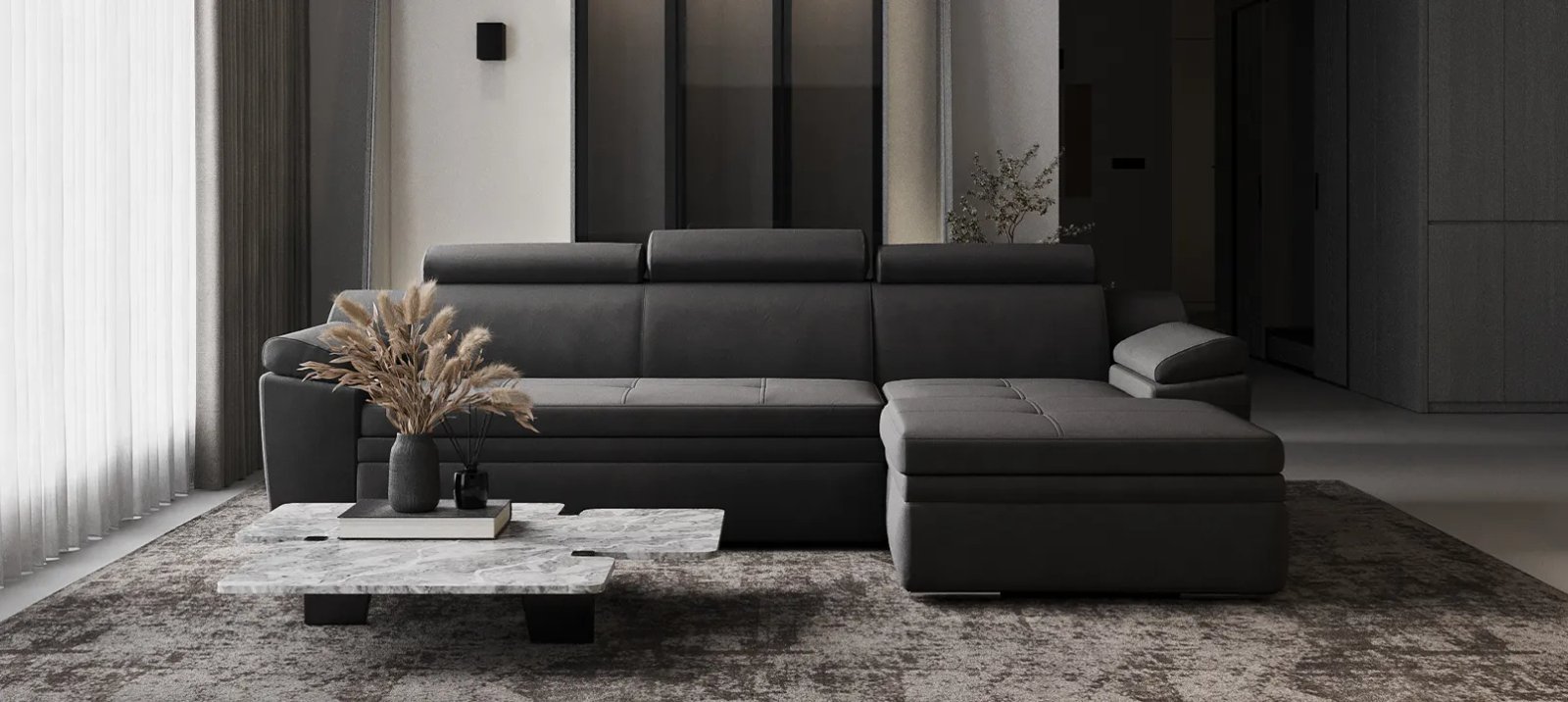 Pilka Nelson sofa lova su išskleista miegamąja dalimi ir plačiu gulimu paviršiumi.