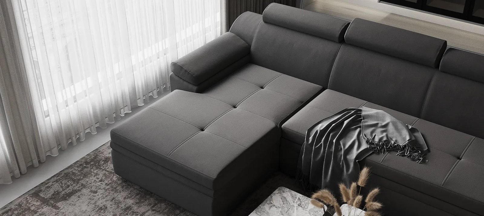 Pilka Nelson sofa lova moderniame interjere su minkštomis dekoratyvinėmis pagalvėmis.