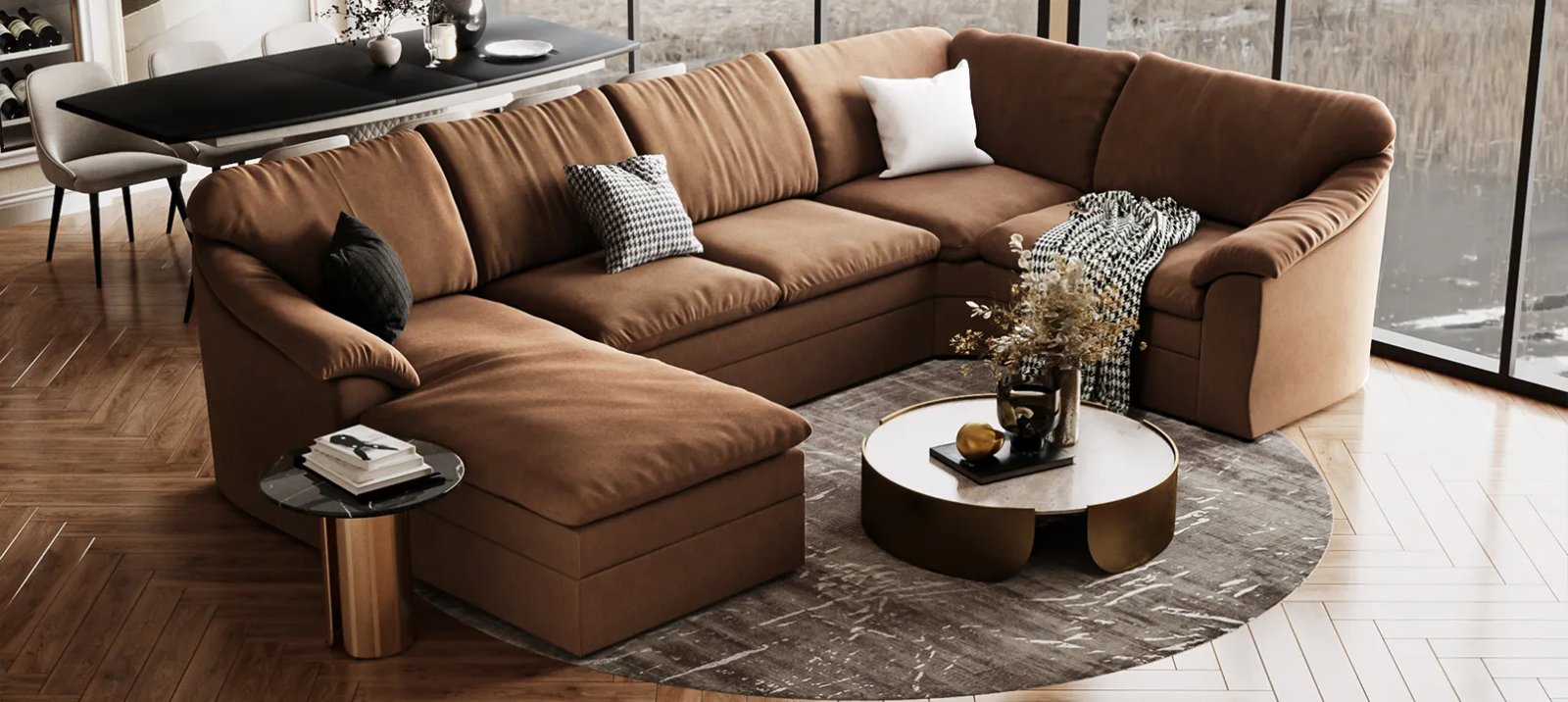 Pilka Vilnius sofa lova iš priekio su žemais porankiais ir dekoratyvinėmis pagalvėmis.