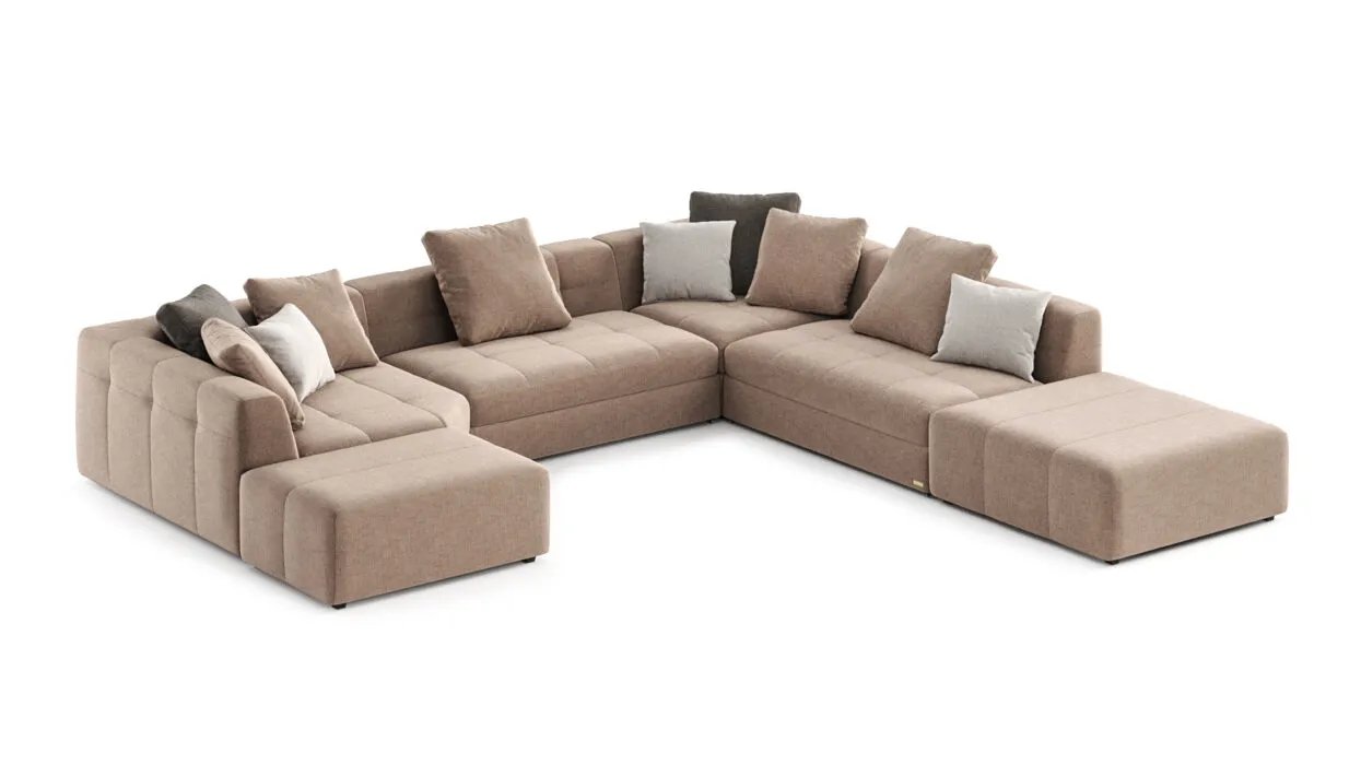 Dortmund sofa iš šono su minkštu korpusu ir plačia sėdyne.