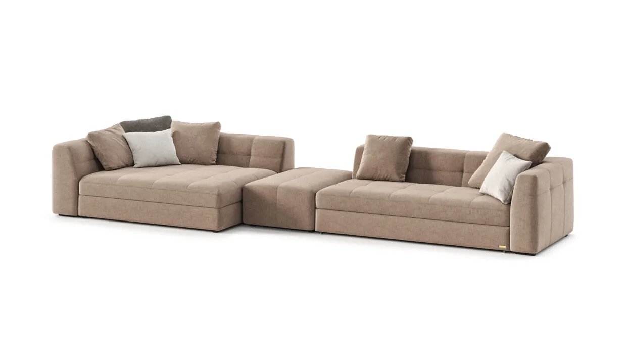 Dortmund kampinė sofa iš šono su giliomis sėdynėmis ir žemu korpusu.