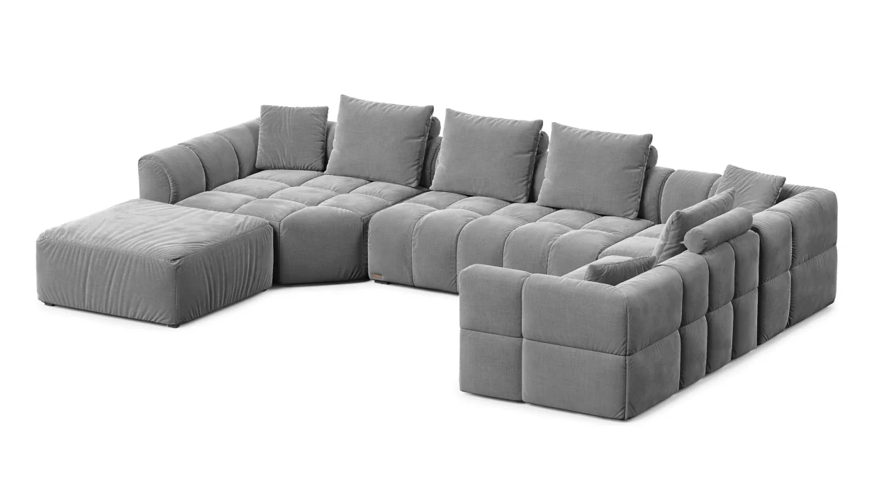 Dakar XL sofa lova su plačiu šezlongu ir minkštu tekstiliniu apmušalu.